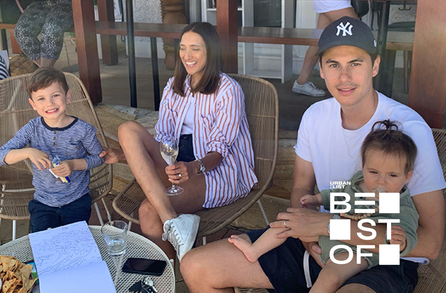 A family sitting together at a cafe. 
