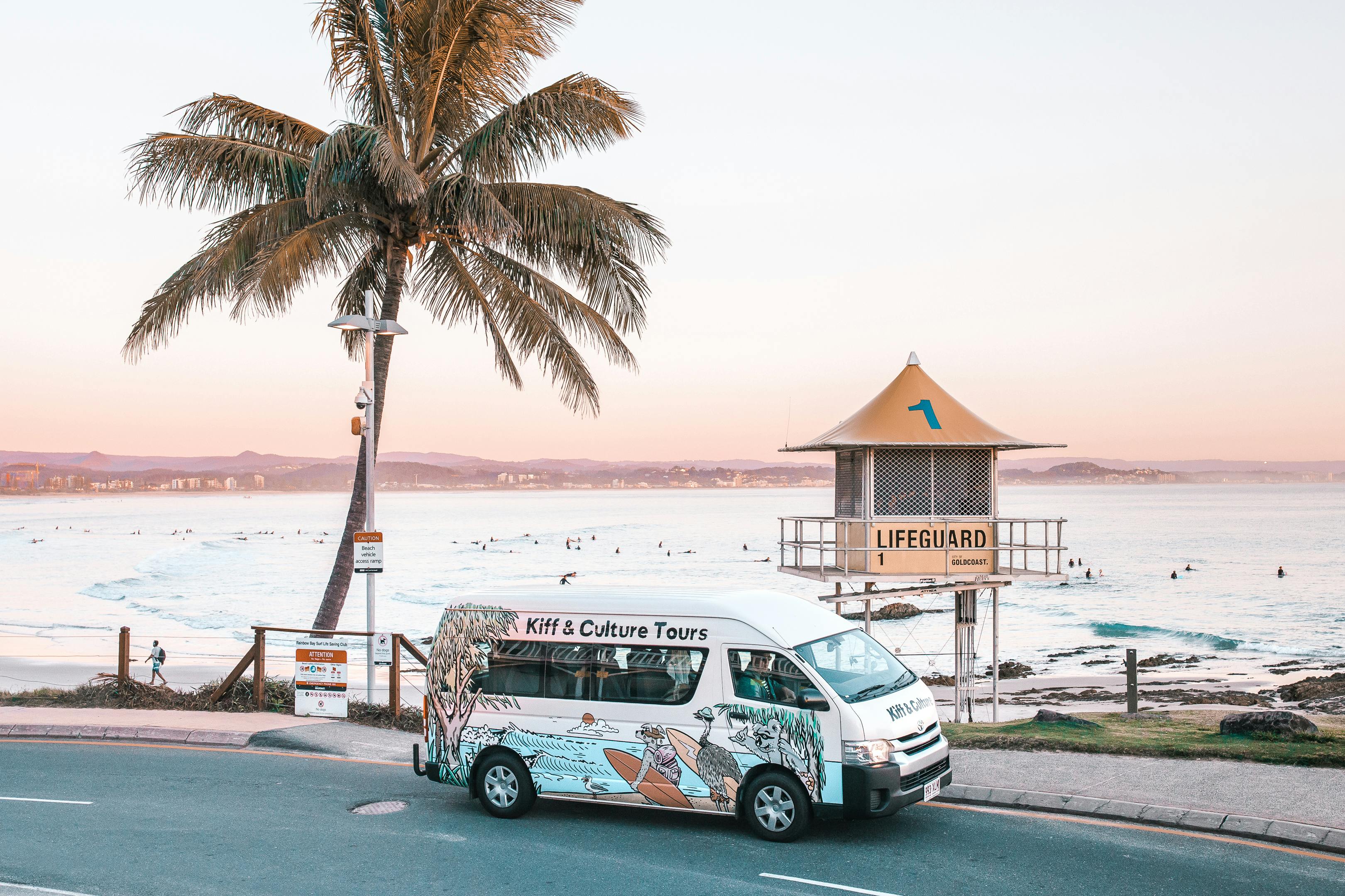 a van against a beautiful beach backdrop