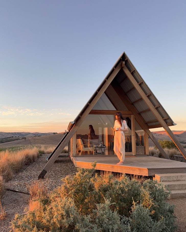 A view of a pointy Kimo Eco Hut one of the best tiny houses in Australia