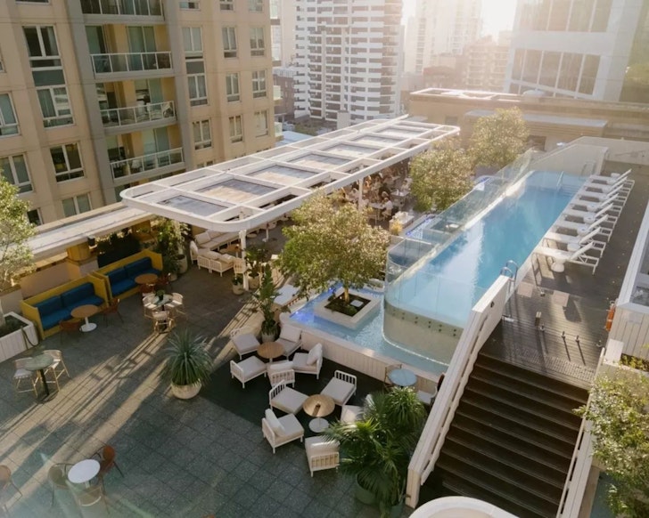 An aerial view of the pool and bar at Kimpton Margot Sydney one of the best hotels for British and Irish Lions Tour