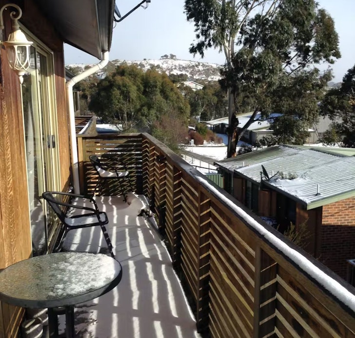 The balcony with a view at Kirwan Bed And Breakfast one of the best Airbnb Rooms in Jindabyne