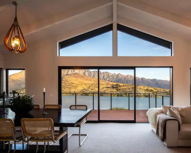 The view of the mountains from the lounge window at Korimako one of the best Airbnbs for large groups in Queenstown