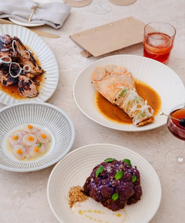 kōst Is The Sleek New Coastal Bar And Grill Venue Bringing Fire-Kissed