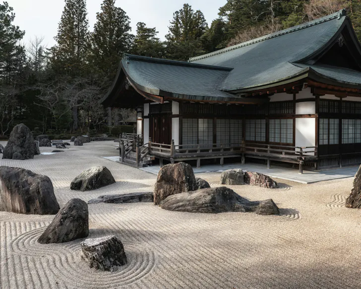The peaceful rock garden in Koyasama with raked sand.
