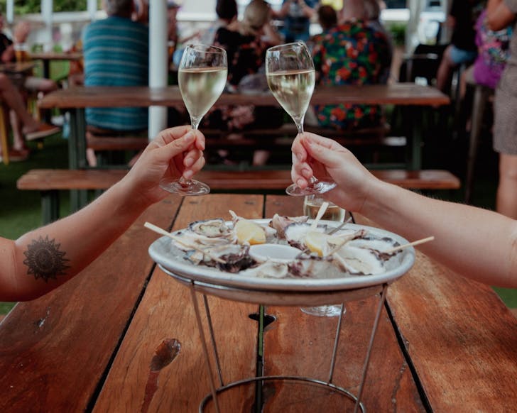 Two people cheersing