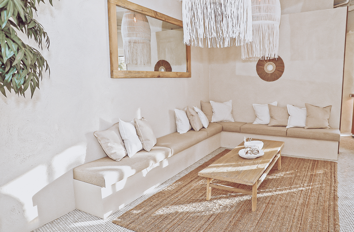 an interior shot of a neutral-coloured lounge area