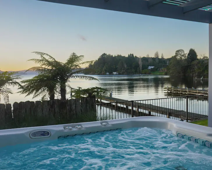 The hot tub with a view at Lakefront Oasis Airbnb NZ
