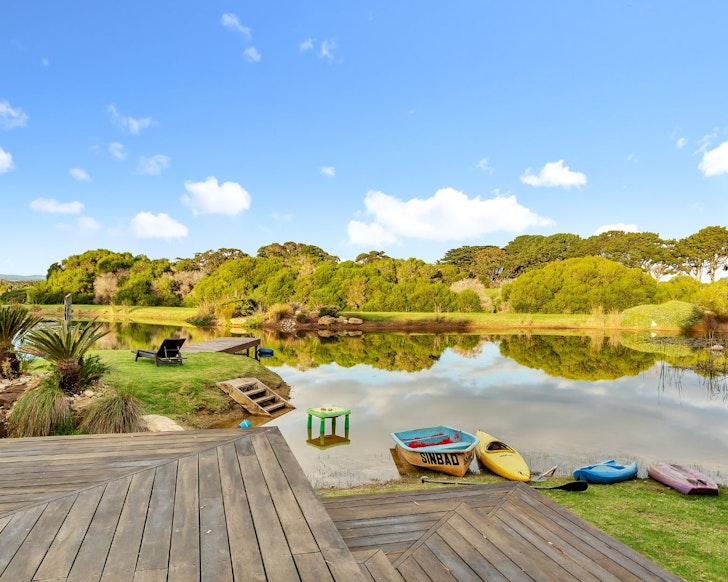 Kayaks near the lake at Lakehouse Estate one of the best large group Airbnbs Victoria