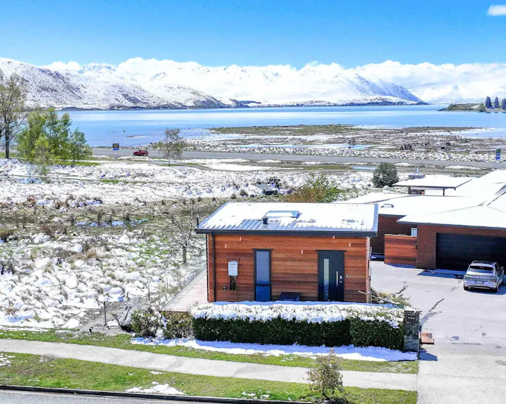 A view of Lakeview Tekapo Starscape Suite with the lake behind, best Lake Tekapo accommodation