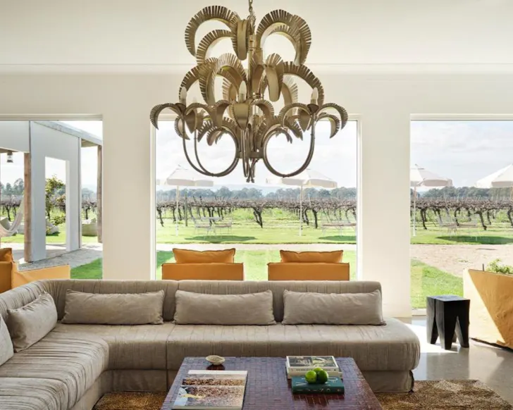 A guest liunge overlooking the vines at Lancemore Milawa one of the best winery stays Victoria
