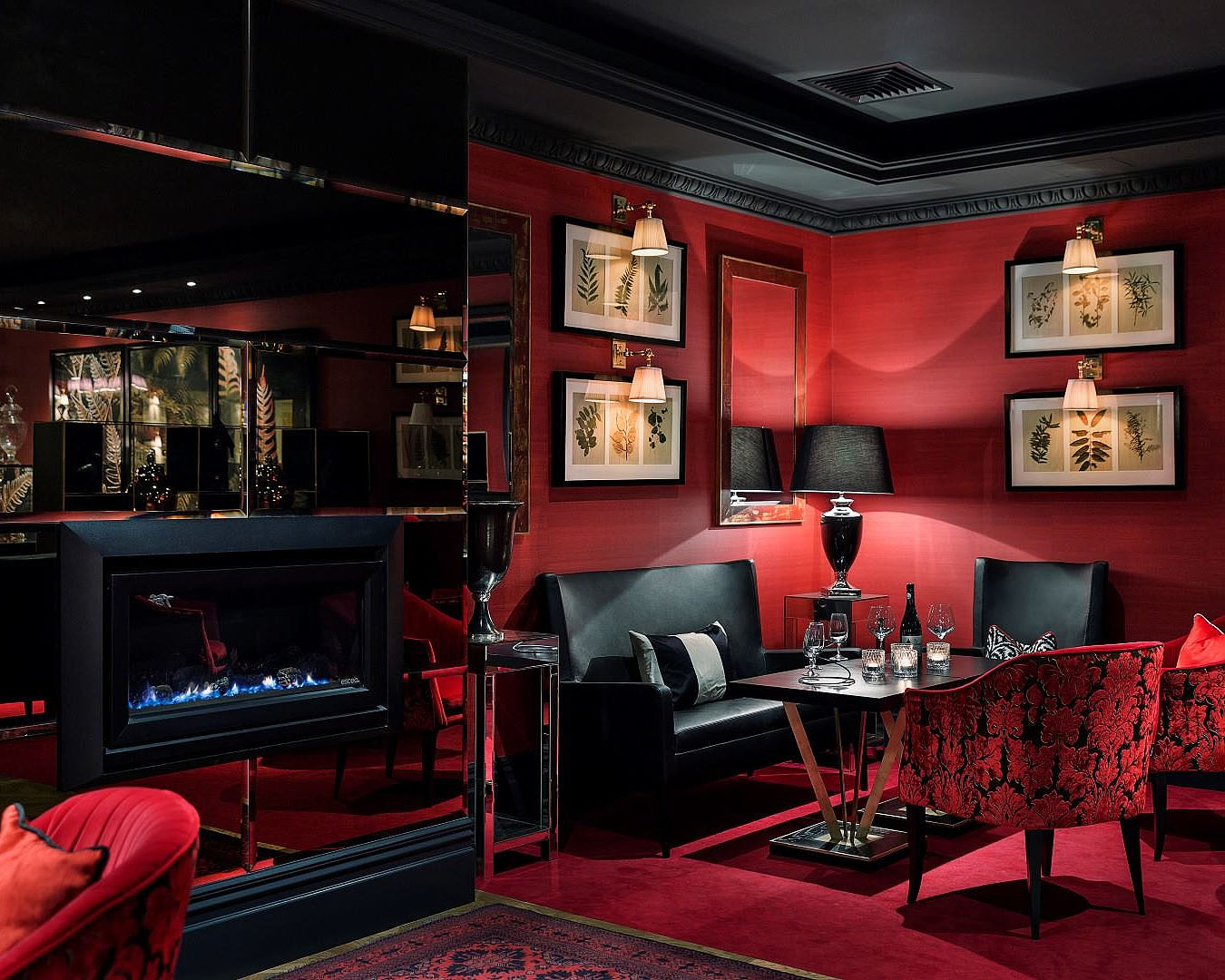 A sumptuous red room at Le Salon Rouge, one of the best bars in Queenstown.