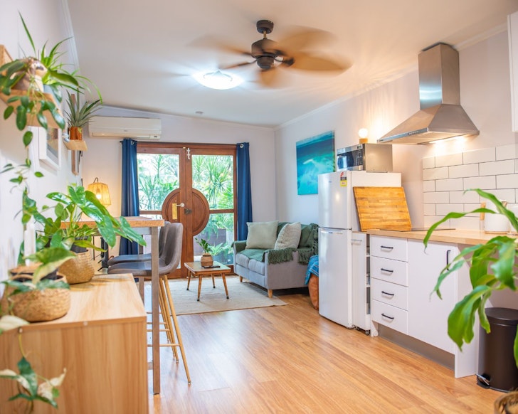 The living space with plants at Leafy Green Guesthouse best Airbnbs Cairns