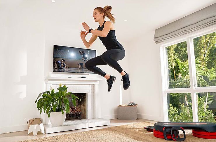 Woman getting active in the front room