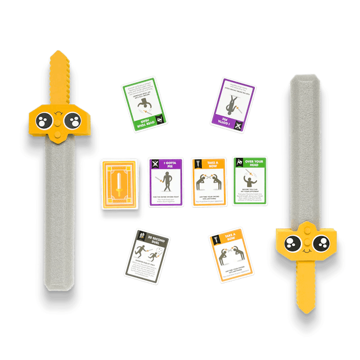Swords with happy faces and a table top game. 