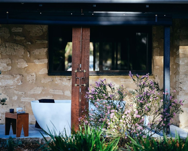 The outdoor bath on the deck at Limestone Bungalow best Airbnbs WA