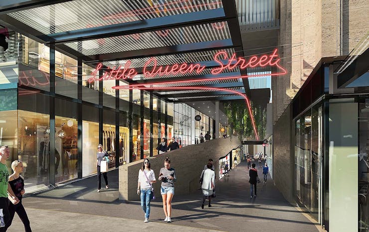 A sign reads little queen street over an artist rendering of the new Commercial Bay shopping district.
