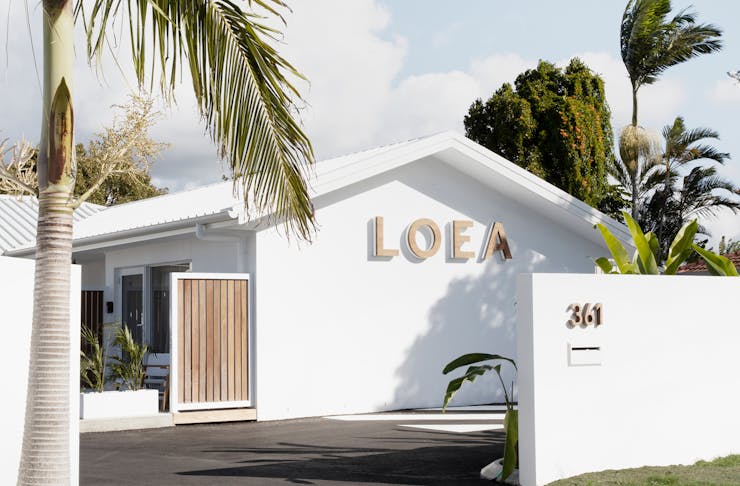 White exterior of LOEA Hotel on the Sunshine Coast