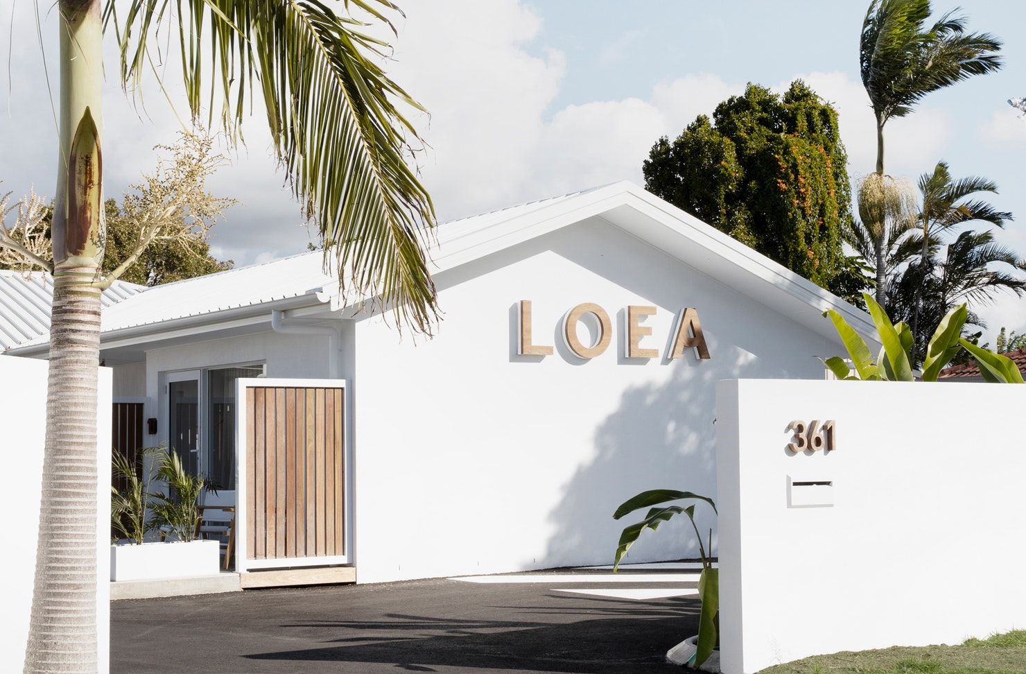 White exterior of LOEA Hotel on the Sunshine Coast