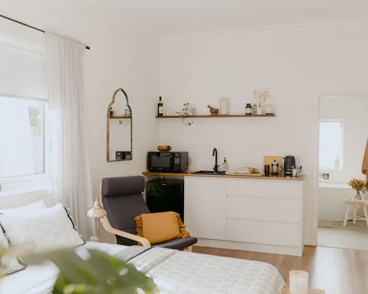 The bed and living space at Lola By The Bay best Busselton Airbnbs