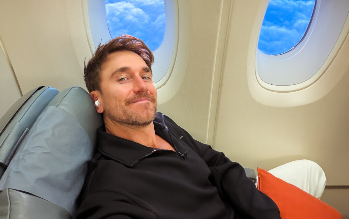 Travel Creator Tyson Mayr Shares His Go-To Tips For Surviving And Thriving On Long-Haul Flights