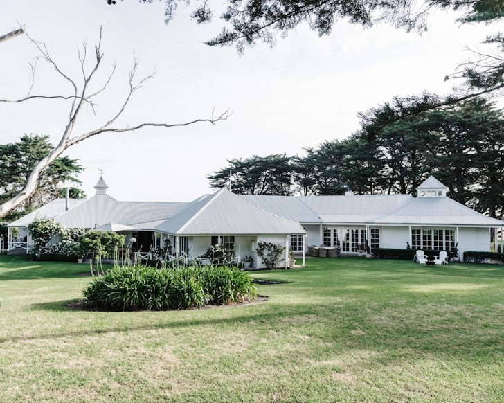The pretty white exterior of Longmeadow Estate one of the best beach house Airbnbs Victoria