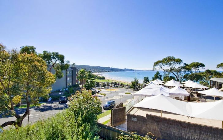 A shot of the ocean from Lorne accomodation with blue skies and sun.