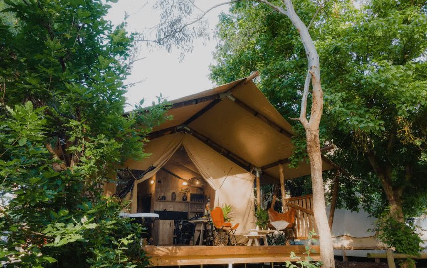 A leafy tent set amongst the trees, some of the best glamping in Victoria. 