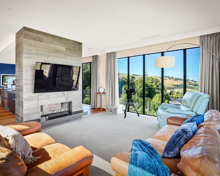 The living space with a view at Luxury Mountain View Villa best large group Airbnbs New Zealand