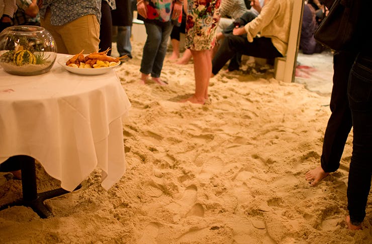 A restaurant filled with sand 