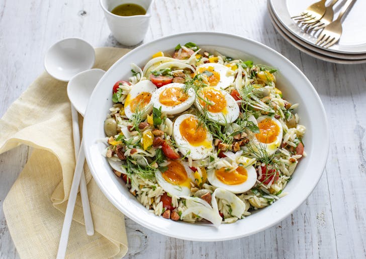 Mediterranean Risoni Salad in a large, beautiful bowl