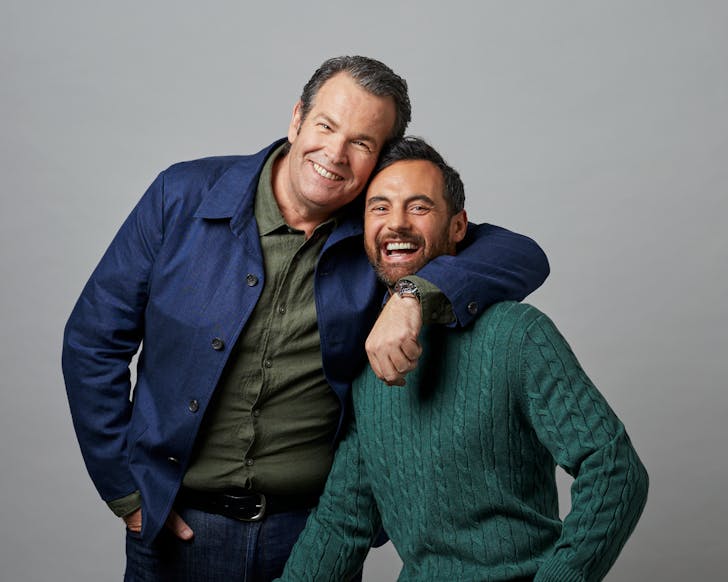 Two men embrace in a photograph, one of them being interviewee Gus Worland