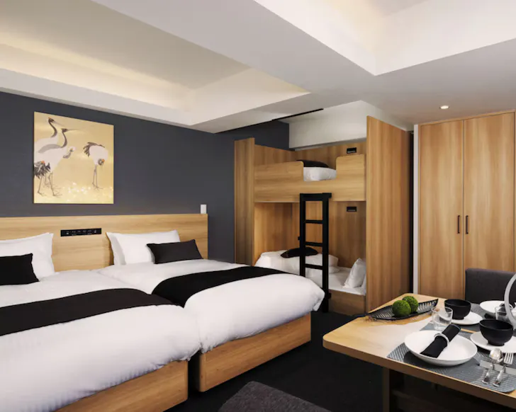 A spacious room with bunkbeds for kids at MIMARU Osaka.