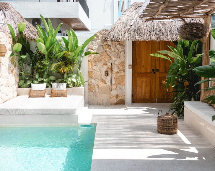 The pool and gorgeous courtyard at Macan Villa one of the best villas in Canggu Bali