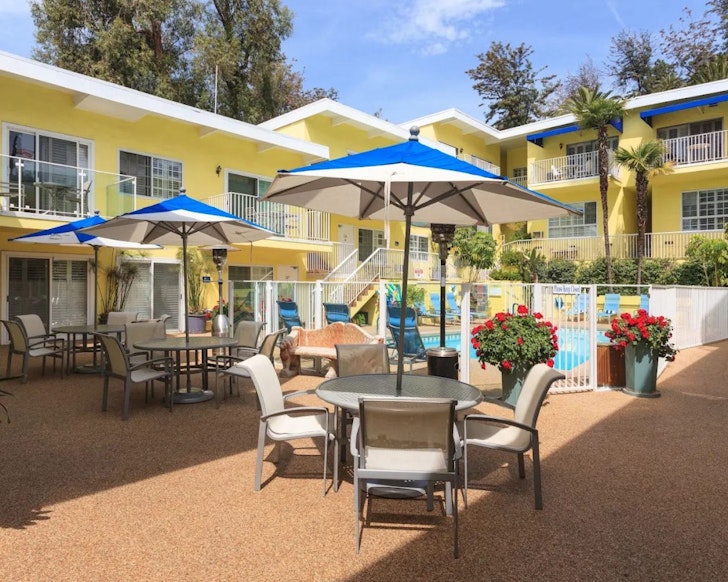 A view of the pool at Magic Castle Hotel one of the best hotels for families Los Angeles