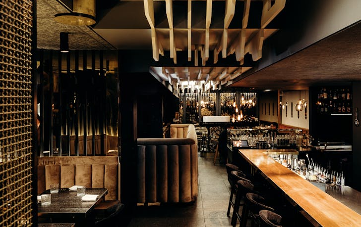 A dimly lit restaurant with one of the top private dining rooms Melbourne has.