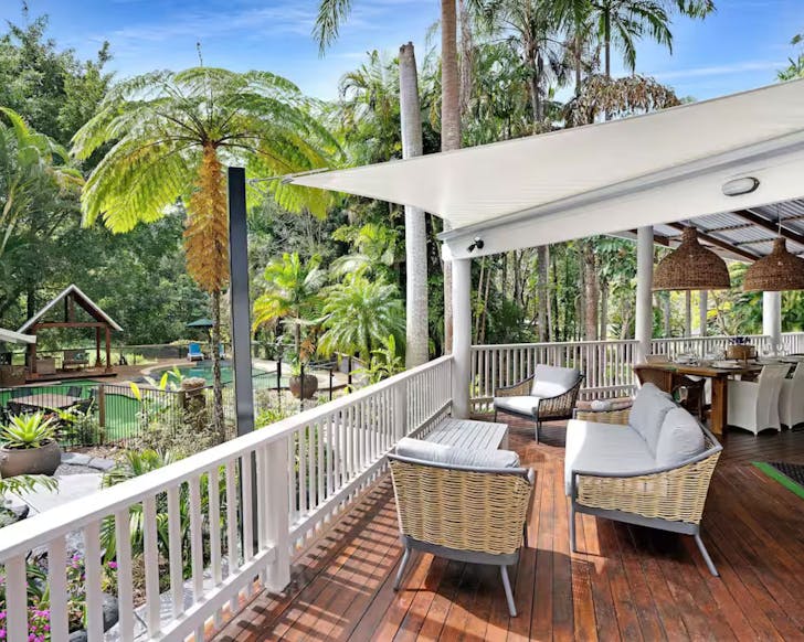 The deck overlooking the pool at Main Creek Getaway large group Airbnb near Sunshine Coast