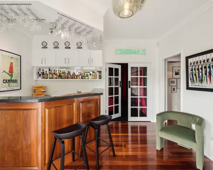 The bar and cinema at Maison Marie one of the best Airbnbs for large groups near Brisbane