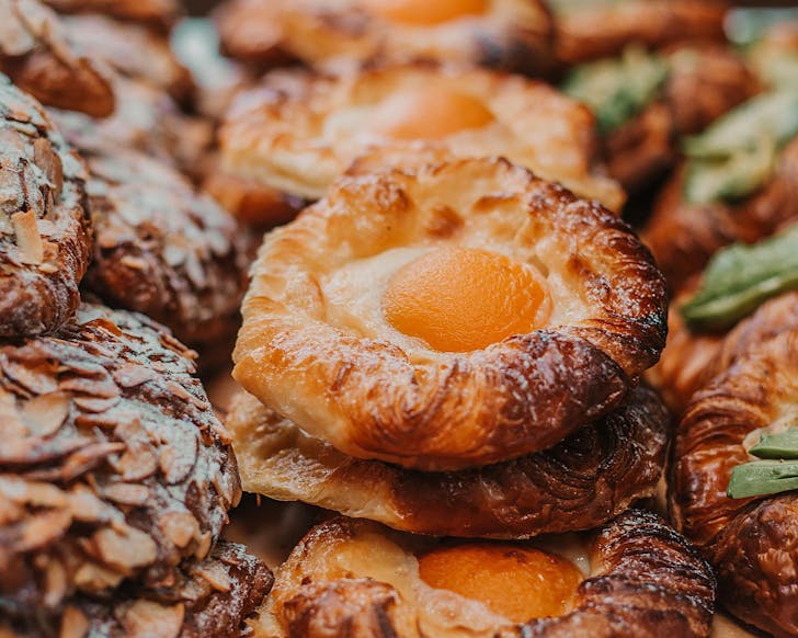 Almond croissants, apricot galettes and other delicious vegan pastries from Maison Des Lys, one of the best vegan bakeries in Auckland. 