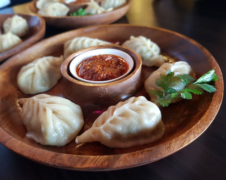 A dish of plump chicken momo (dumplings) at Malabar Nepalese And Indian Kitchen. 