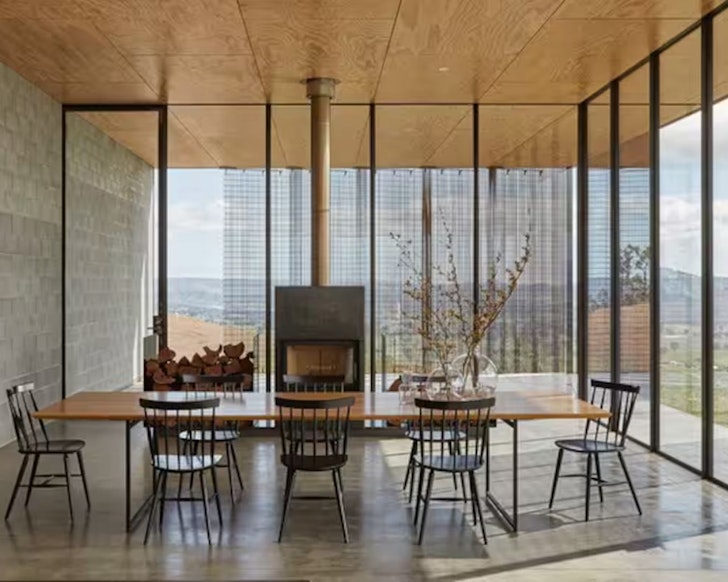 The dining space with a view at Mansfield House one of the best Airbnbs for large groups Victoria