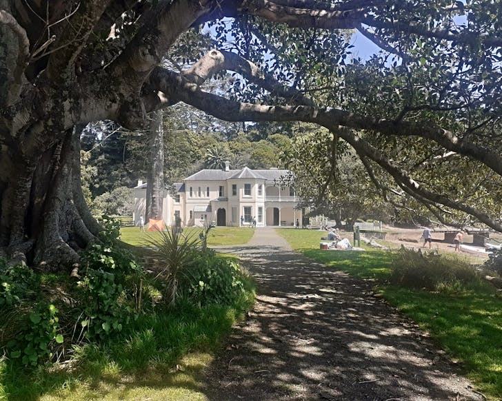 Looking down a path to the iconic Mansion House. 