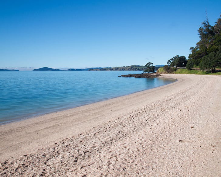 Maraetai Beach near Duder Regional Park is seen completely empty at sunrise.