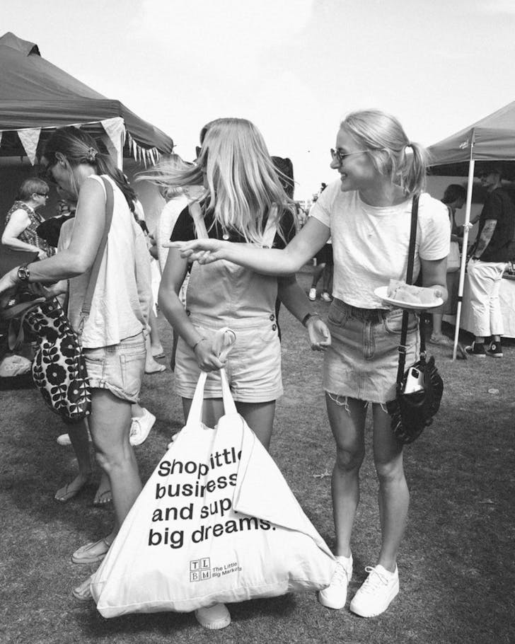 People enjoying buys and bites at the Little Big Markets. 
