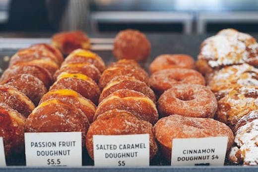 Rows of filled doughnuts at Mary Street Bakery in Claremont