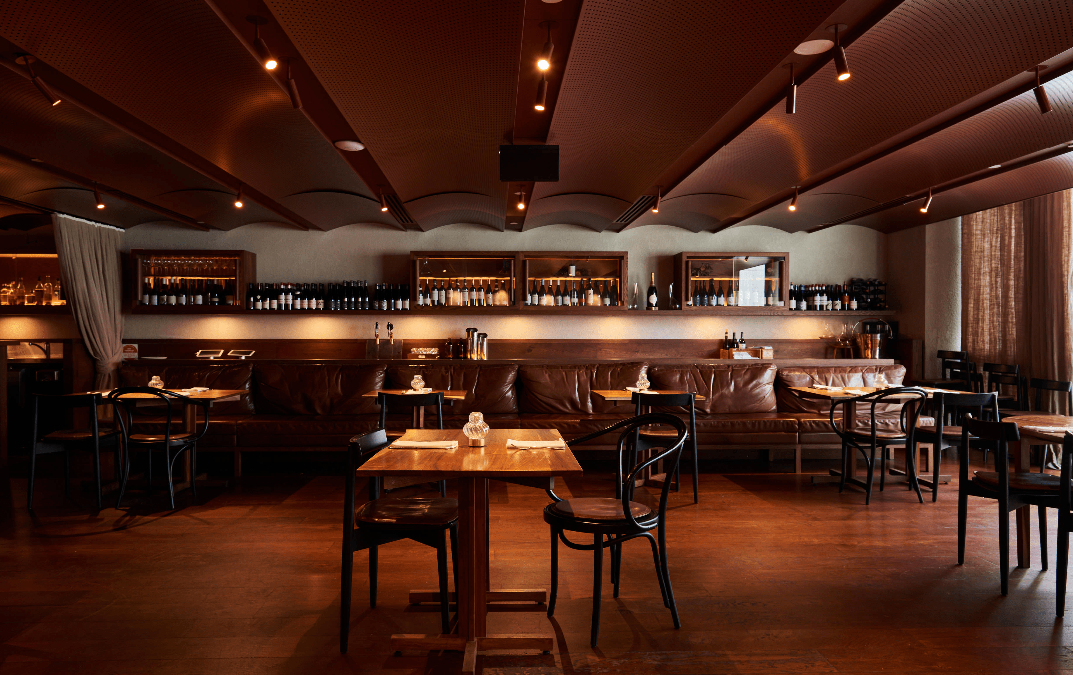 A sleek wooden dining room, a top south yarra restaurant 