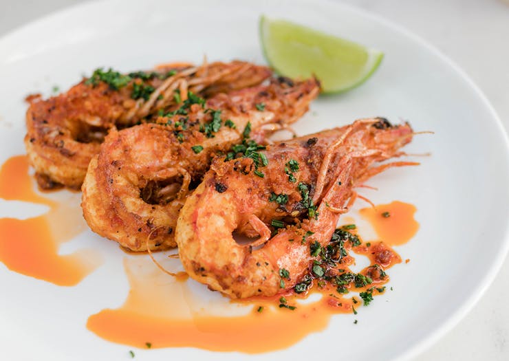 Grilled prawns on a plate.