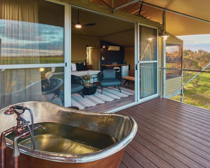 The copper outdoor bath at Melaleuca Luxe Airbnb WA