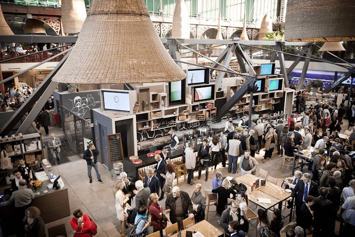 A large food hall filled with people.