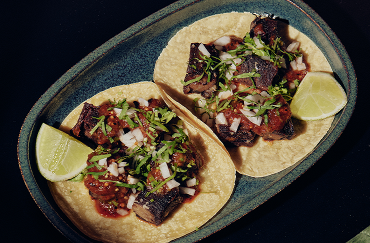 Two braised ox tongue tacos at Mesa Verde in Melbourne.