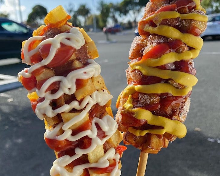 Two whopping great hot dogs from Mighty Hot Dog, one of the best restaurants in Auckland CBD. 